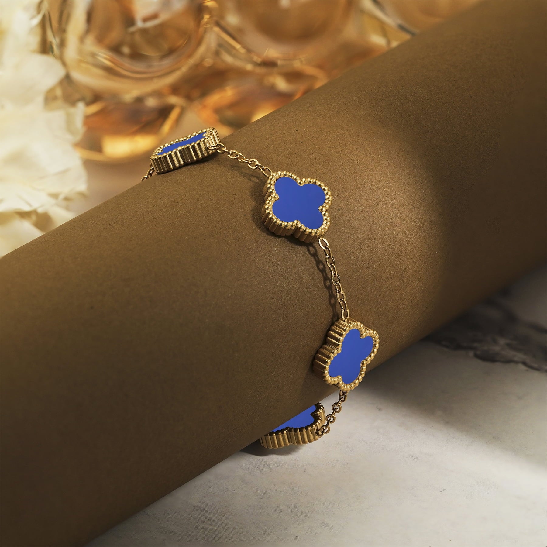 White Flower Link Bracelet in Yellow Plated