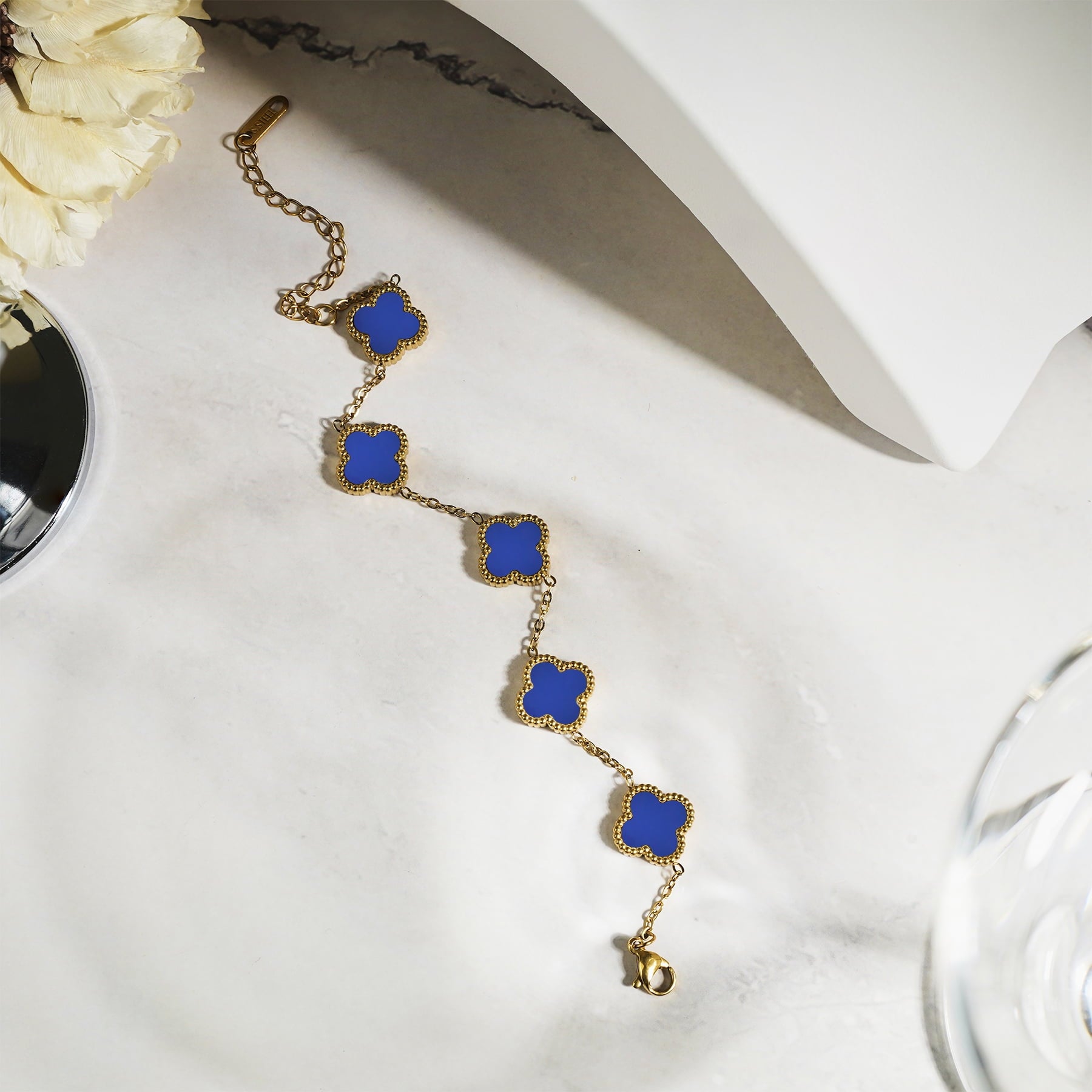 White Flower Link Bracelet in Yellow Plated