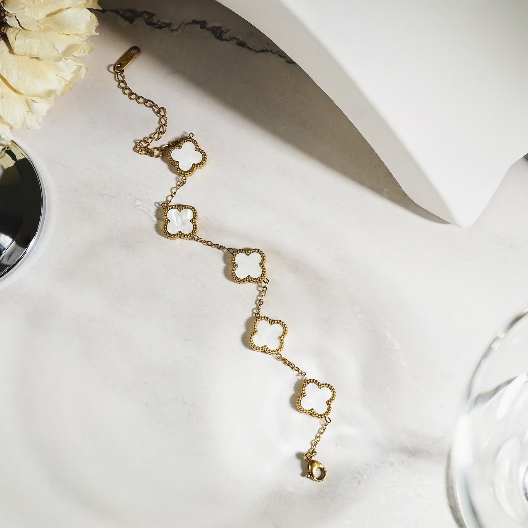 White Flower Link Bracelet in Yellow Plated