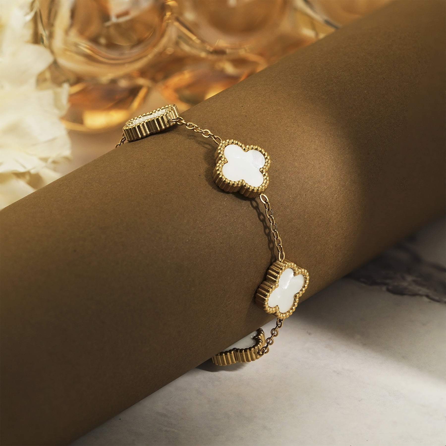 White Flower Link Bracelet in Yellow Plated